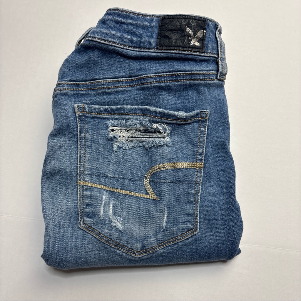 American Eagle Women Size 8 Jeans High Rise Jeggings Distressed Raw Stretch Flaw